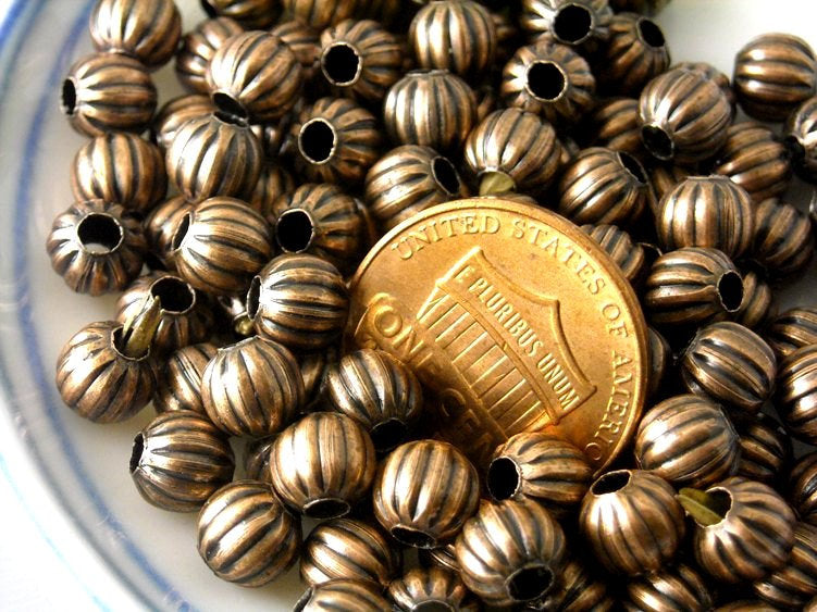 Corrugated Metal Bead in antique copper, 6mm - 50 pcs - Pim's Jewelry Supplies