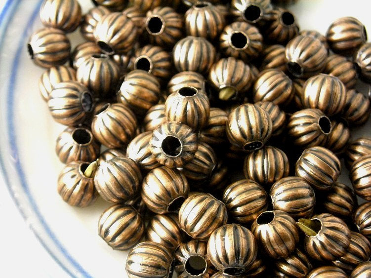 Corrugated Metal Bead in antique copper, 6mm - 50 pcs - Pim's Jewelry Supplies