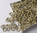 100 of 4mm Antique Bronze Open Jump Rings - Pim's Jewelry Supplies