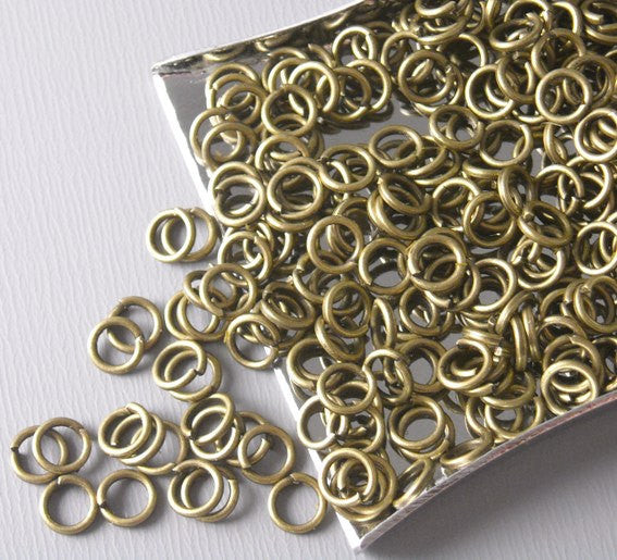 100 of 4mm Antique Bronze Open Jump Rings - Pim's Jewelry Supplies