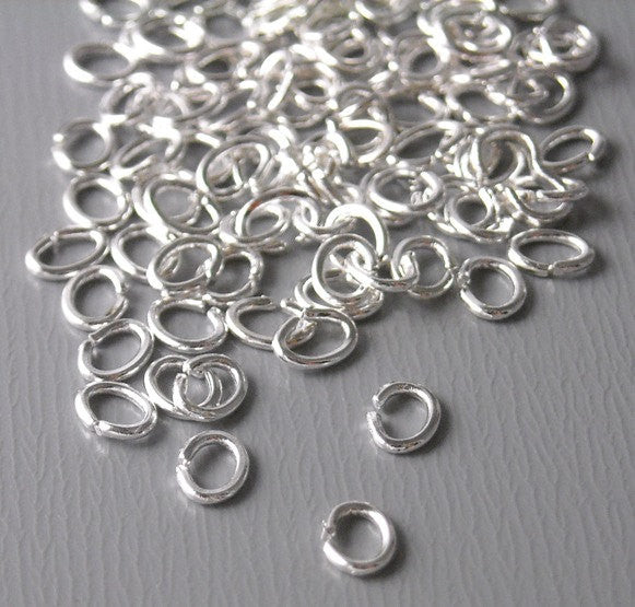 100 of 4mm x 3mm Silver Plated OVAL Open Jump Rings - Pim's Jewelry Supplies