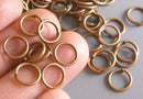 100 of 8mm Antique Copper Open Jump Rings - Pim's Jewelry Supplies