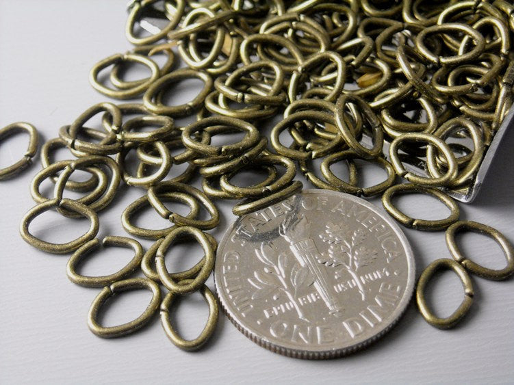 22 gauge 7mm Antique Bronze Oval Open Jump Rings - 50 pcs - Pim's Jewelry Supplies